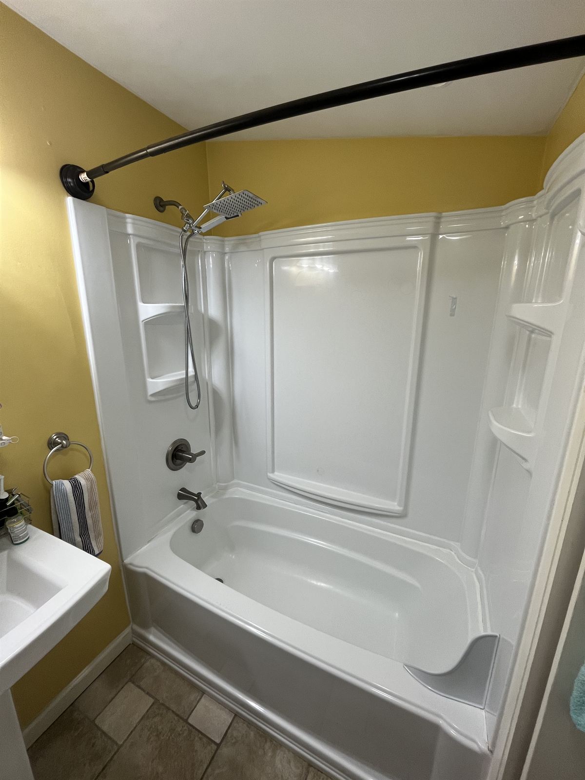 Before: acrylic tub and shower combo