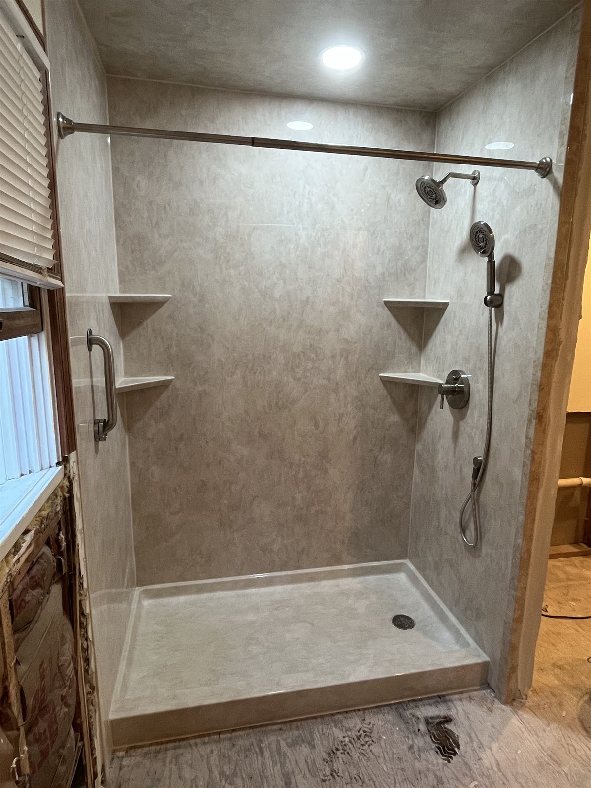 Install day: new marbled acrylic shower with dual heads just installed
