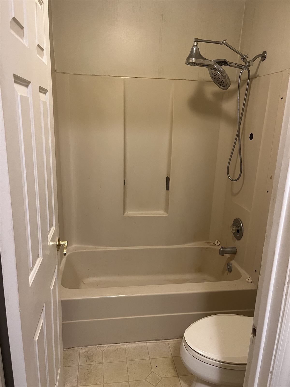 Before: almond tub and wall surround