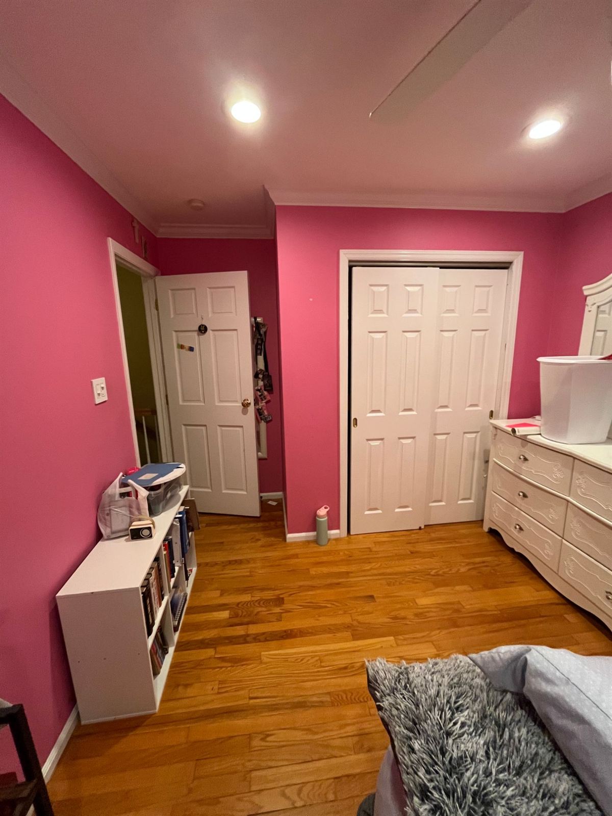Before: the same bedroom in bright pink